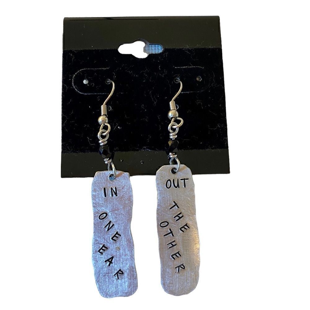 “In one ear” “Out the other” Hammered Silver Toned Drop Earrings.